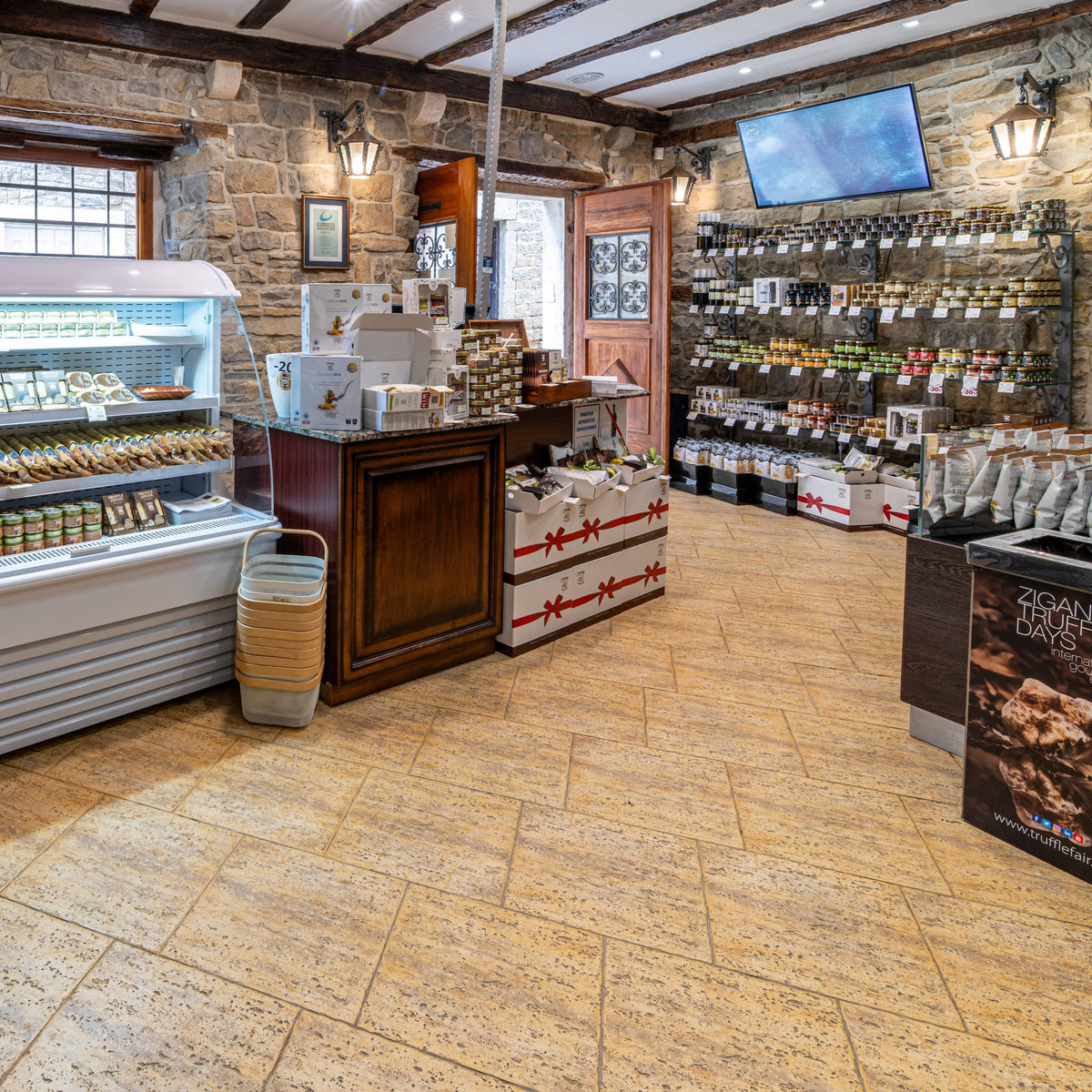 Interior of the Zigante Tartufi shop in Grožnjan with shelves of truffle products